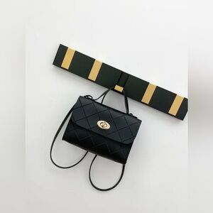 Elegant Black Quilted Handbag